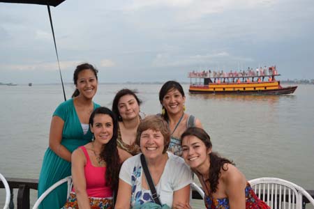 Nursing students next to lake in Cambodia